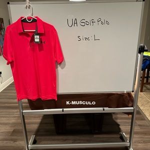 UA pink golf polo